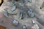 Glas gerade einmal etwas angeschmolzen. Daher wird auf eine Temperatur von 800-850°C geschlossen